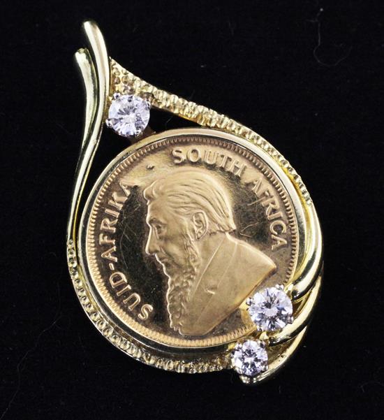 A ¼ krugerrand gold coin set in a 18ct gold pendant mount with three round brilliant cut diamonds, 1.5in.